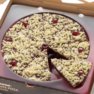 Bakewell Tart chocolate pizza with slice moved out.