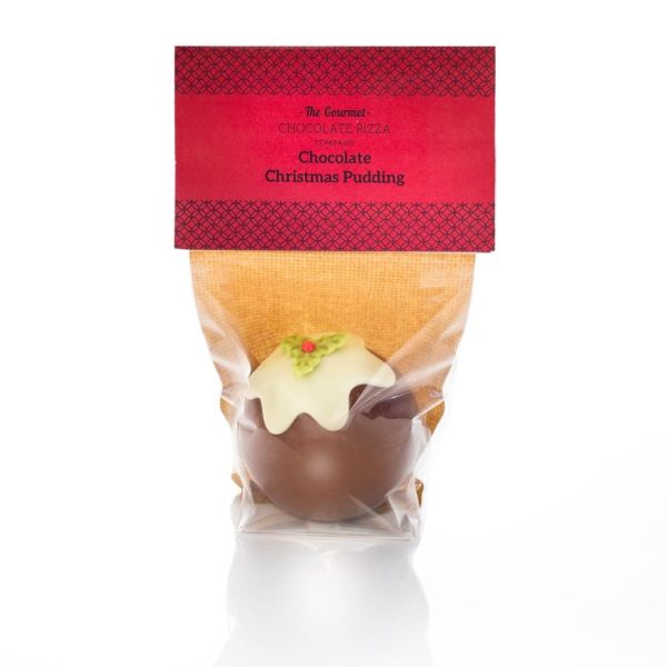 Christmas pudding in chocolate sphere in packaging